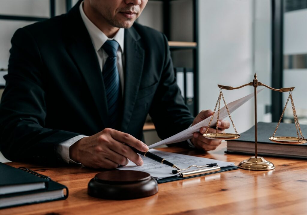 a legal counsel is checking the papers
