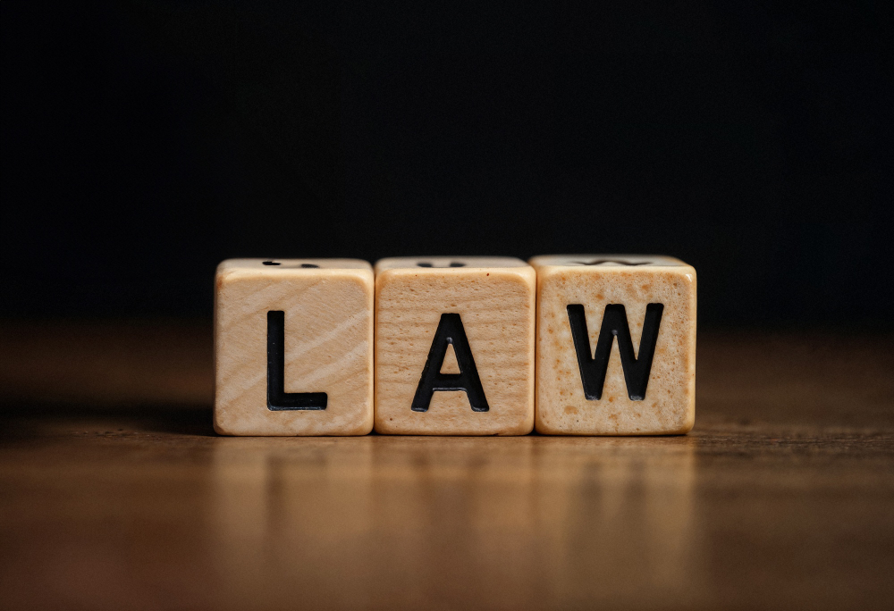 Law word spelled with wooden cubes